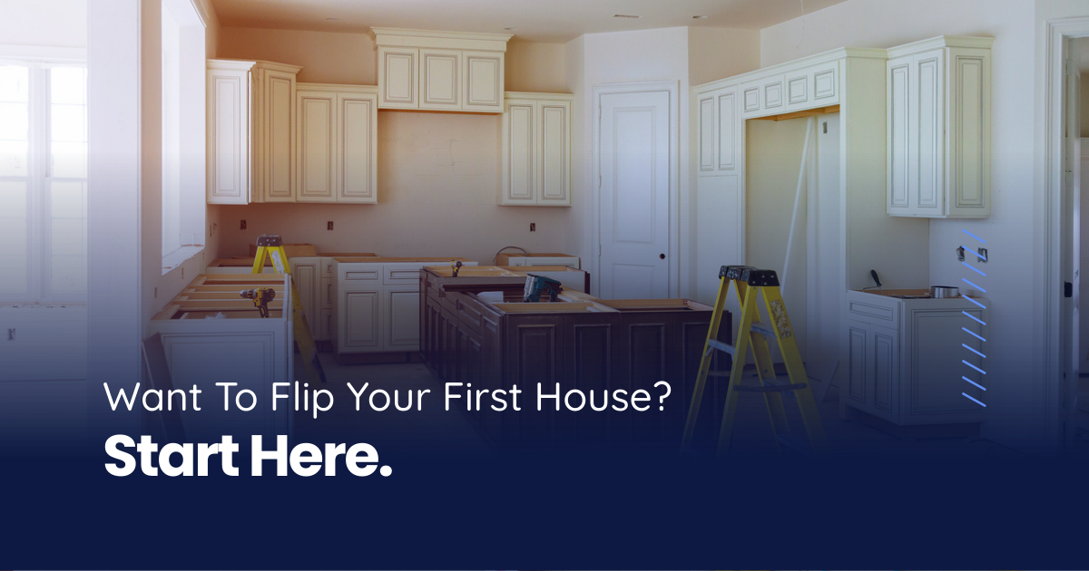 Kitchen renovation in progress showing cabinets being installed with countertops and tools during house flipping project